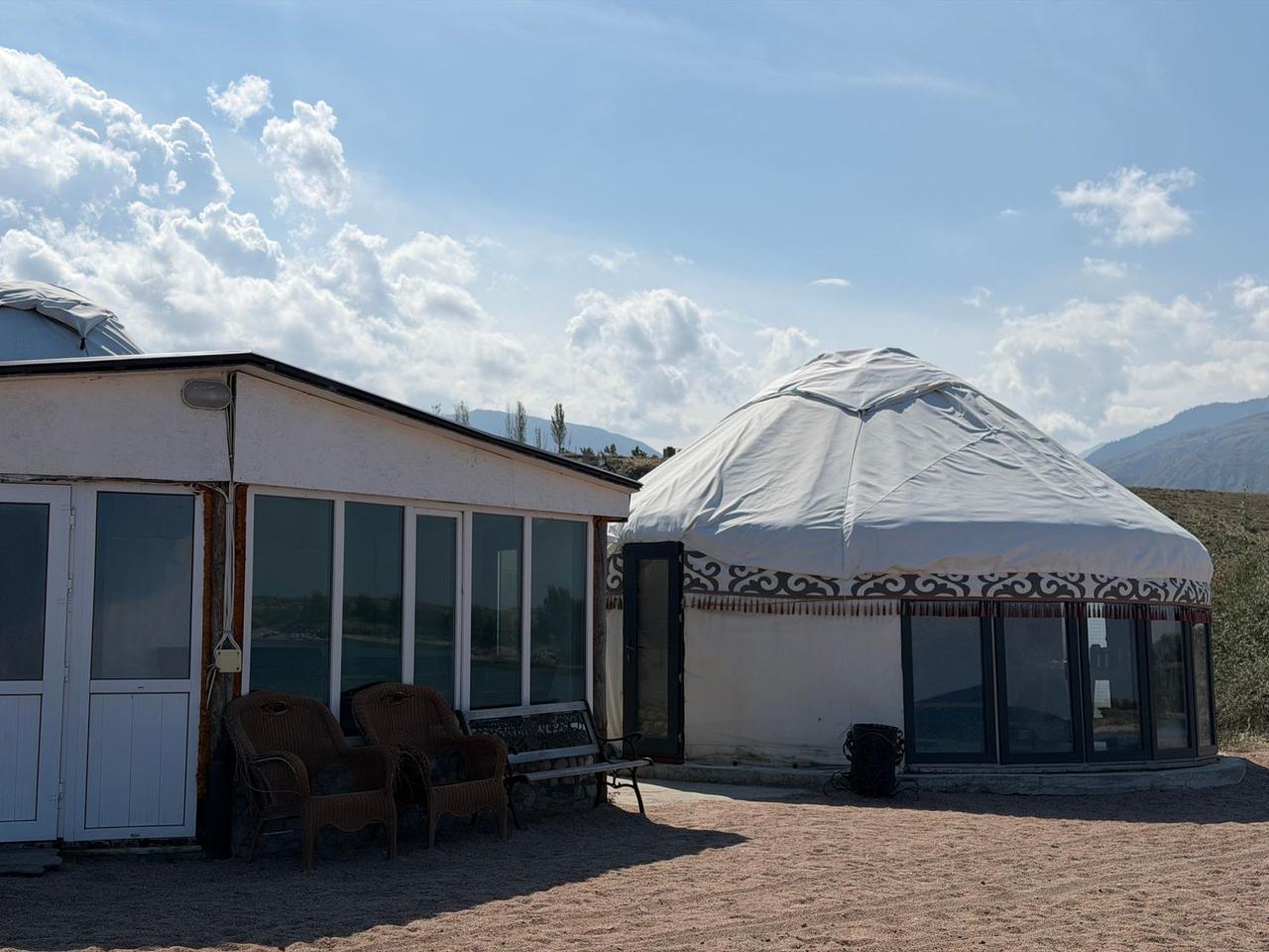 Banya building and a yurt on the beach