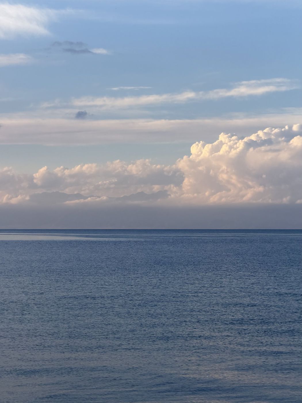 Issyk-Kul and clouds over the water
