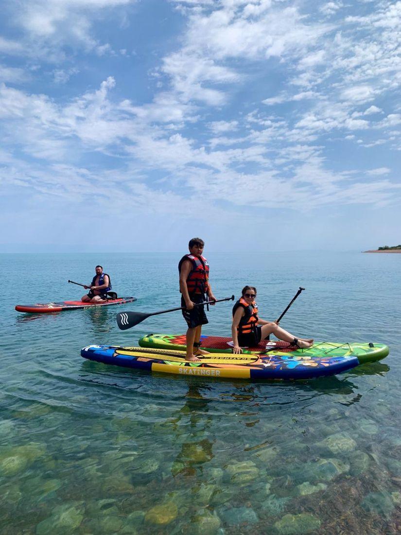 SUP boards on clear water